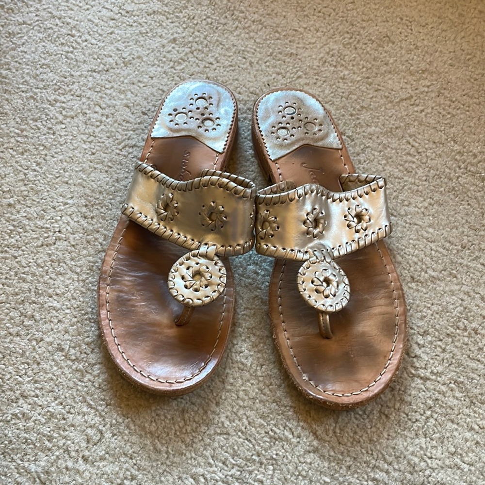 Jack Roger gold sandals. Very comfortable just don’t wear them anymore.